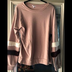 NWT Really soft comfortable sweatshirt with fur on the sleeves